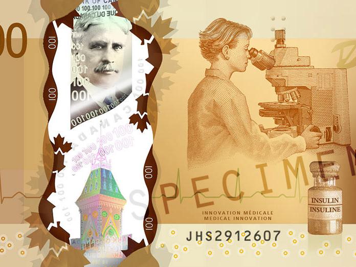 $100 加拿大貨幣鈔票的特寫視圖，其中展示了蔡司顯微鏡。