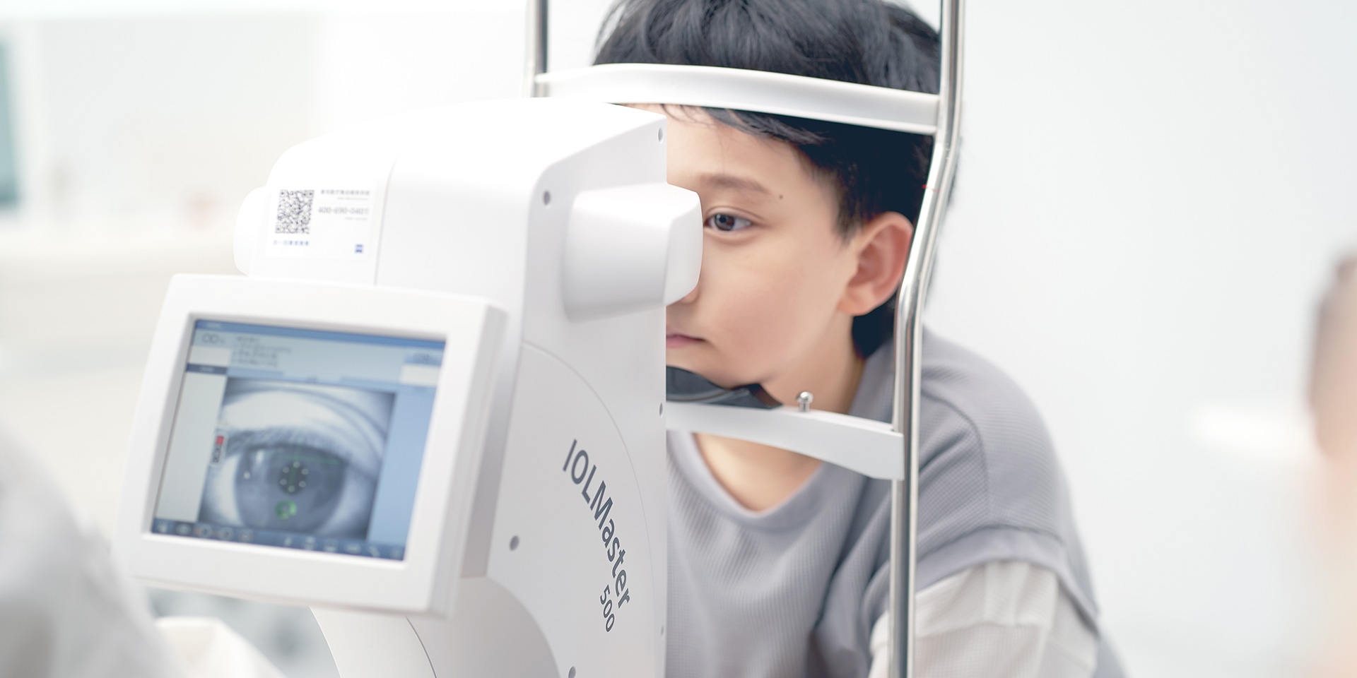 Young girl in eye examination room