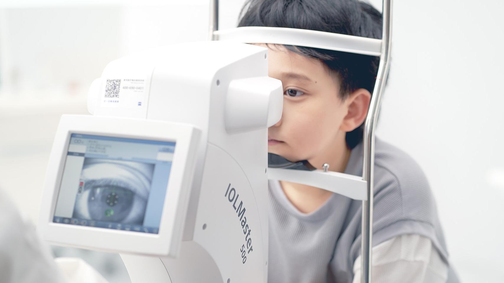 Young girl in eye examination room
