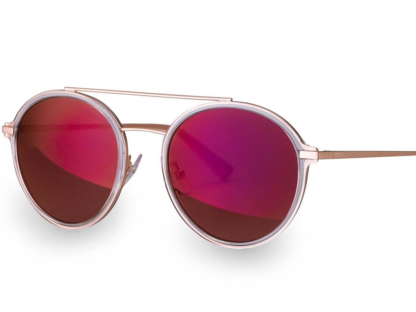 Photograph of fashionable sunglasses with special ZEISS front lens coating in magenta 