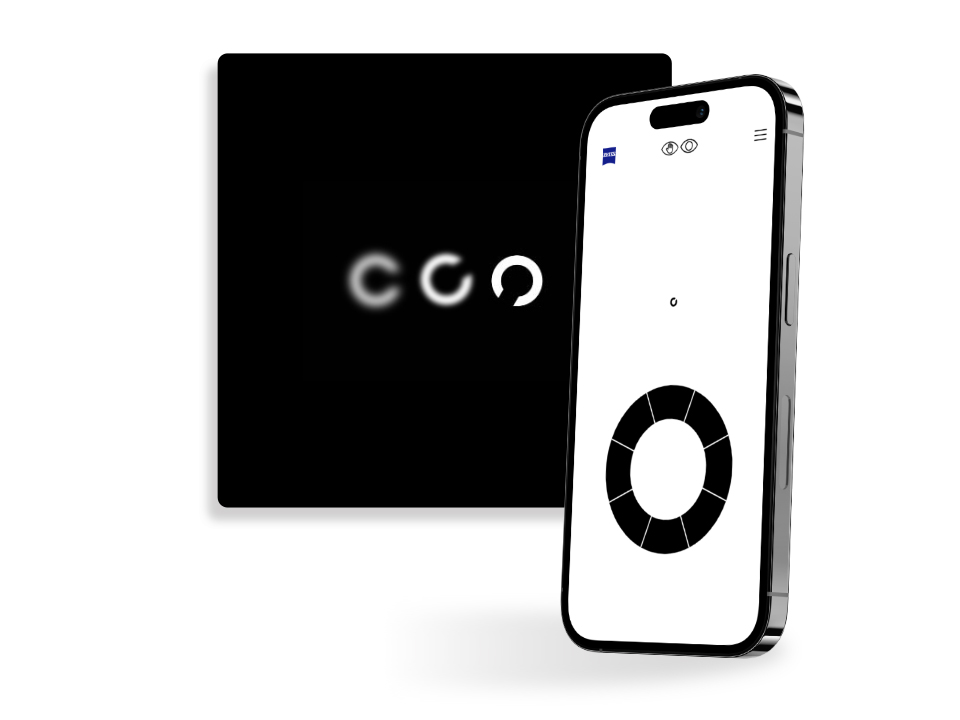 直立放置在一個黑色方形按鈕前面的智能手機顯示蔡司線上視力檢查操作畫面，該按鈕顯示不同清晰度的圓圈，圓圈開口朝不同方向，常用於視力測試。