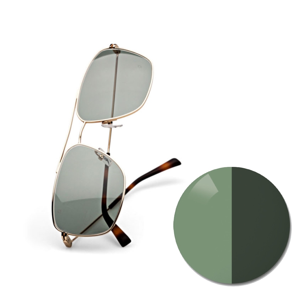 蔡司 AdaptiveSun 灰綠色眼鏡，顯示一個光線中的色點和深色染色色調